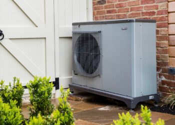 Which government agencies offer heat pump grants?