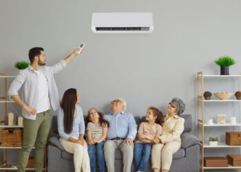 family haveing fun on sofa