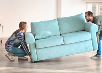 Couple arranging Furniture