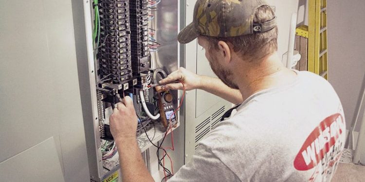 Electrician fixing Electrical Panel Upgrade
