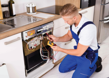 Guy fixing appliances