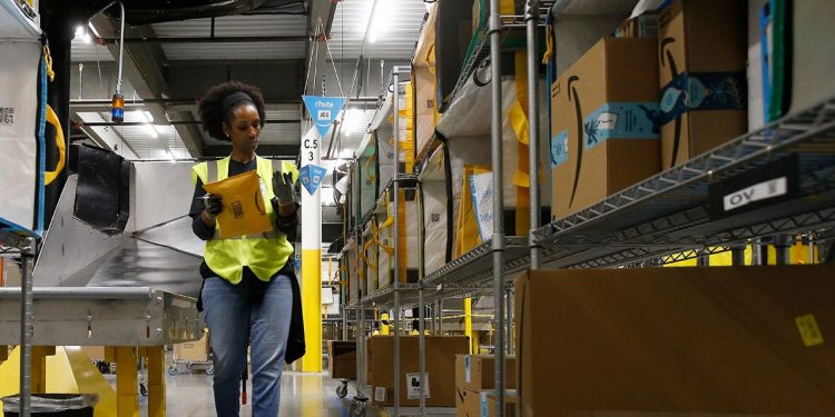 girl working in amazon warehouse