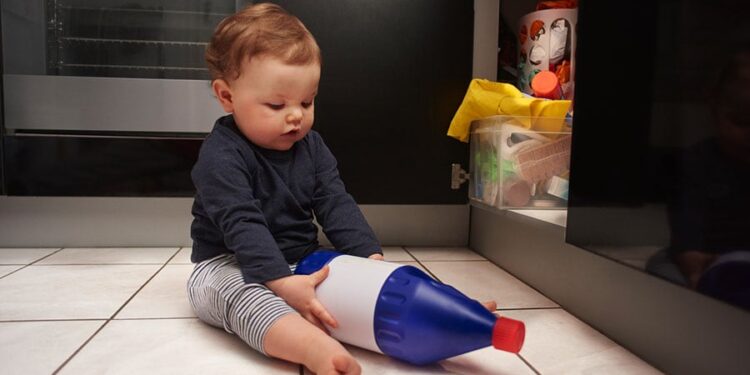 Kid playing with Safety Hazards at Home