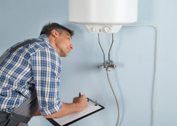 Plumber Checking water heater