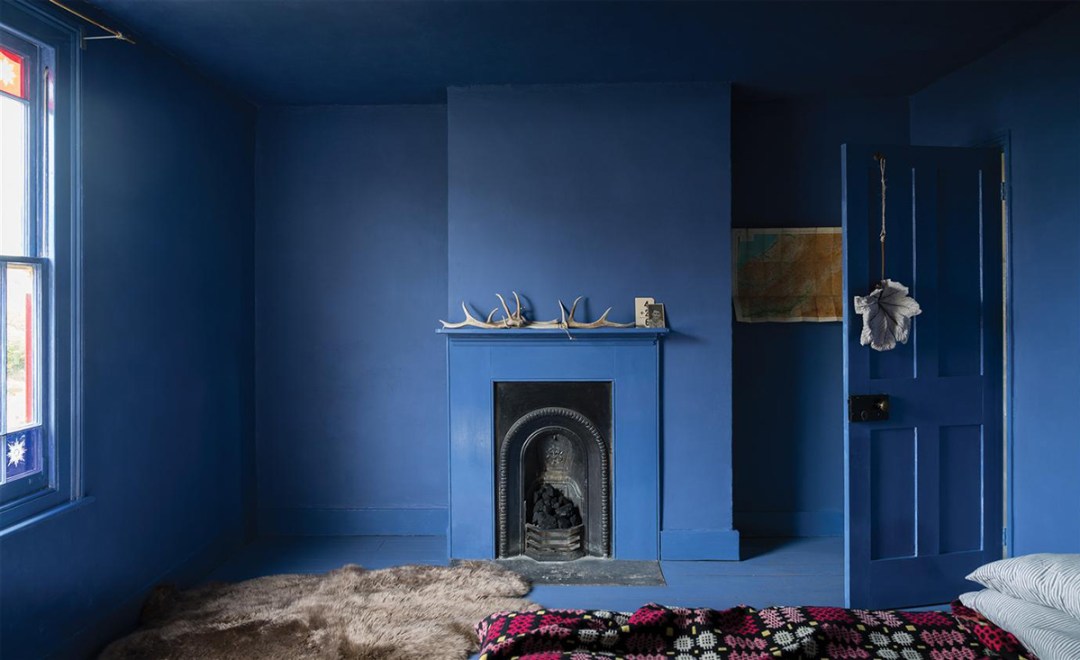 Room walls painted in blue colour