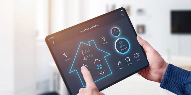 All in one smart home control system app concept on tablet display in man hands