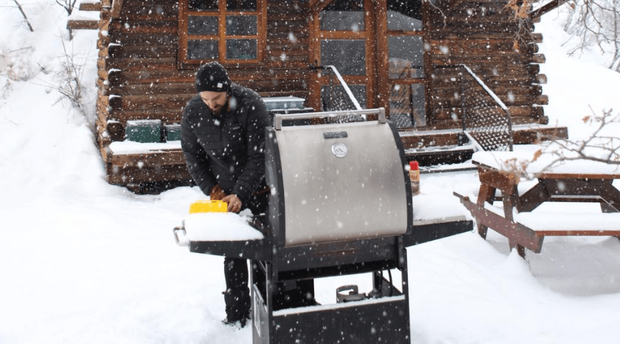 grilling-outdoors-in-snow