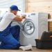 guy repairing washing machine