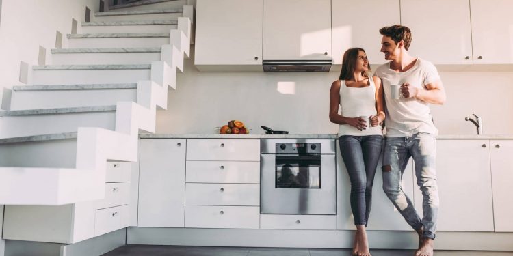 couple standing in kitchen