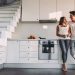 couple standing in kitchen