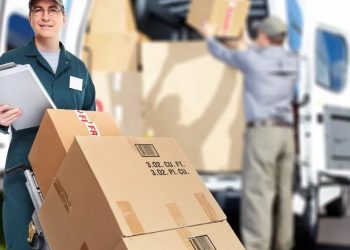 a guy in blue dress helping client to move his ouse