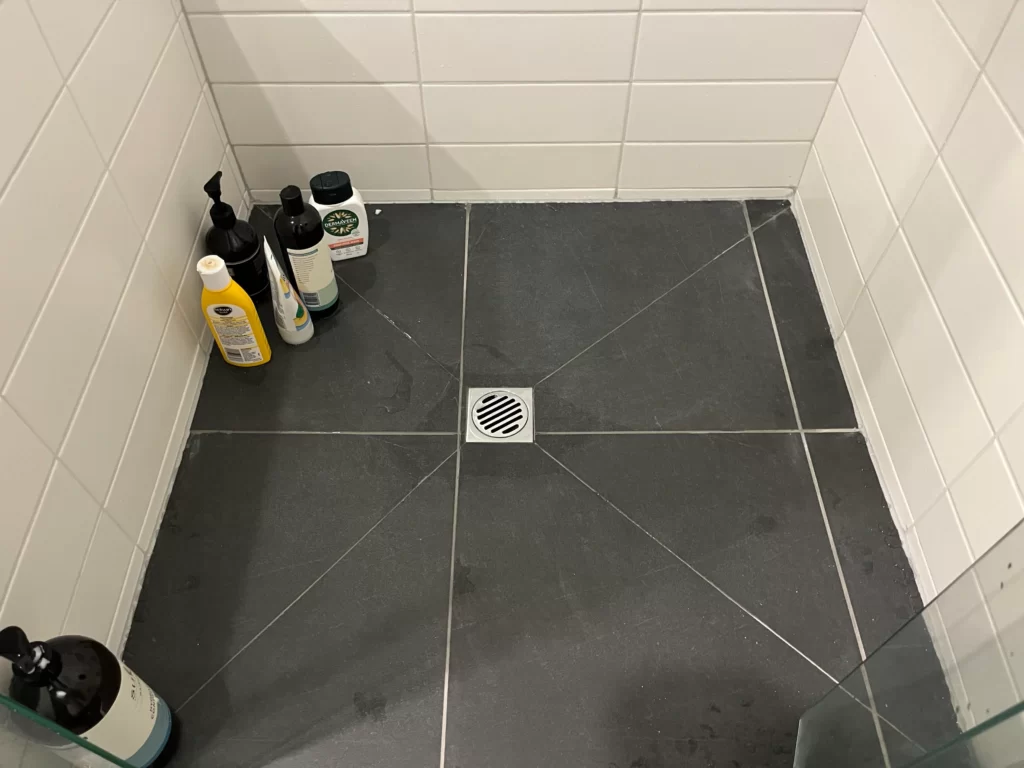 Apply new shower grout