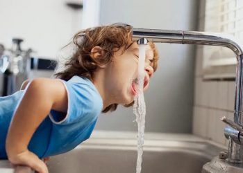 boy drinking tap water