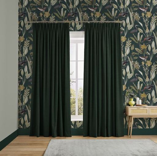 Plain curtain for leafy wallpaper pattern
