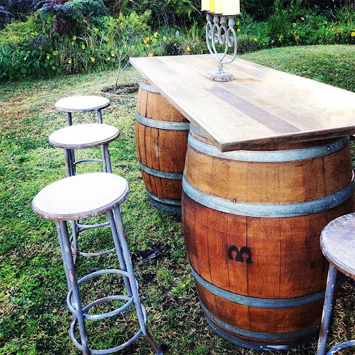 wine barrel table with many seats