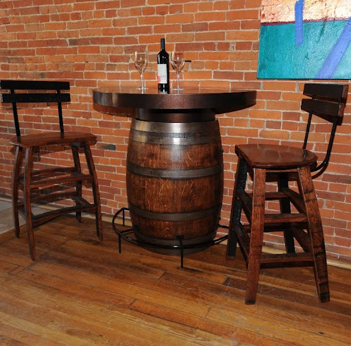 wine barrel table attached to wall