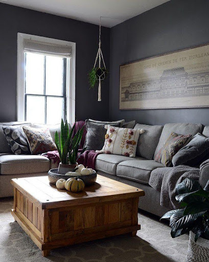 room with gray walls and brown carpet