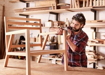 a guy making furniture