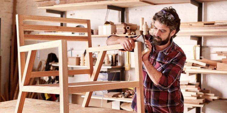 a guy making furniture